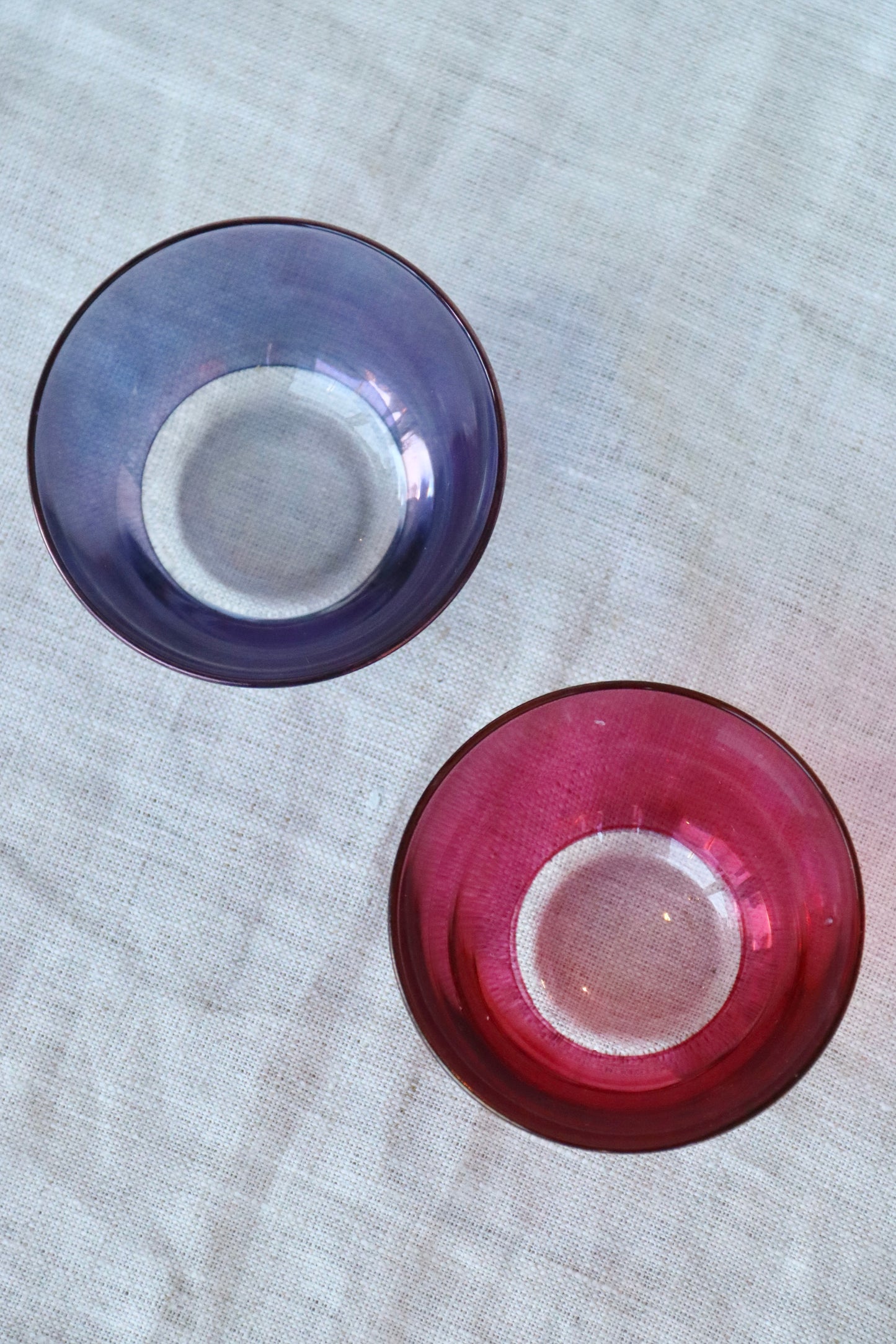 pair of mini colored glass bowls