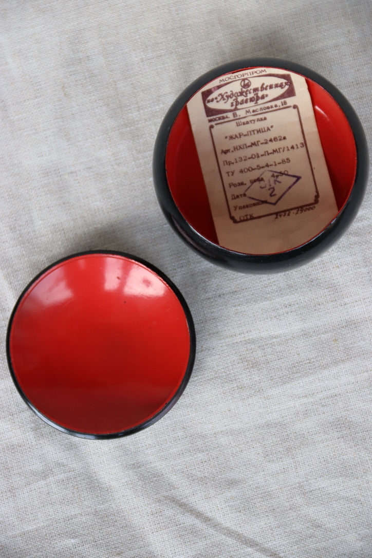 vintage Soviet-era hand-painted black lacquer trinket box with a red and gold Firebird or Phoenix design