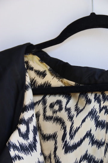 Black silk taffeta evening coat with animal print lining