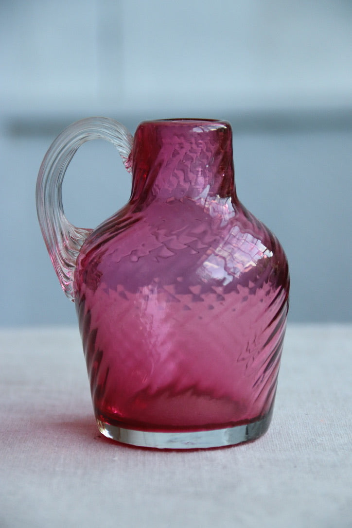 Mini hand blown maroon glass pitcher/vase