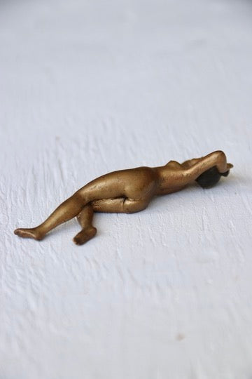 Mini reclining female figure sculpture
