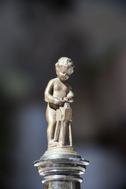 Miniature Bronze Figurine of Cupid Sharpening His Points on Marble Pedestal