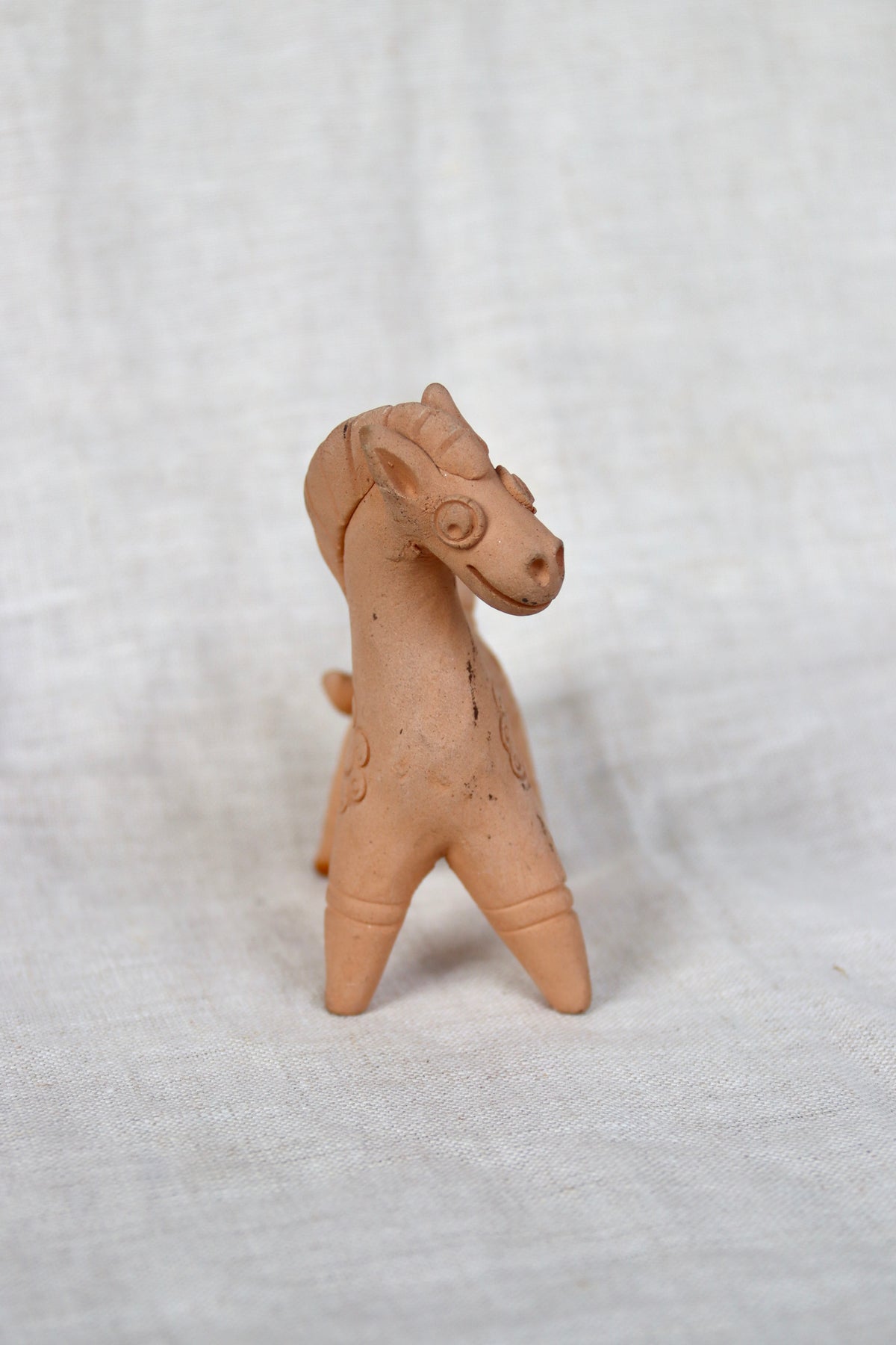handcrafted traditional folk art style unglazed terracotta horse figurine