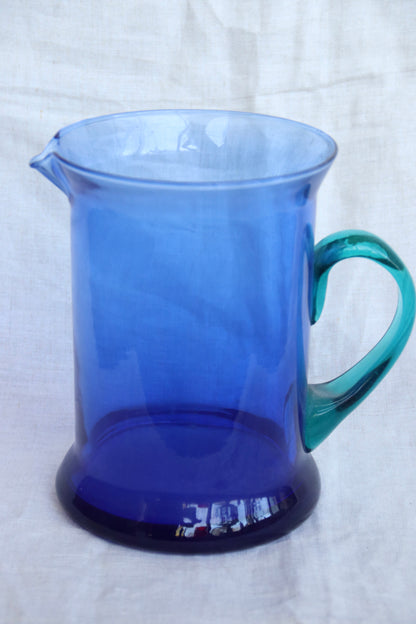 Vintage Blue Glass Pitcher with Teal Handle