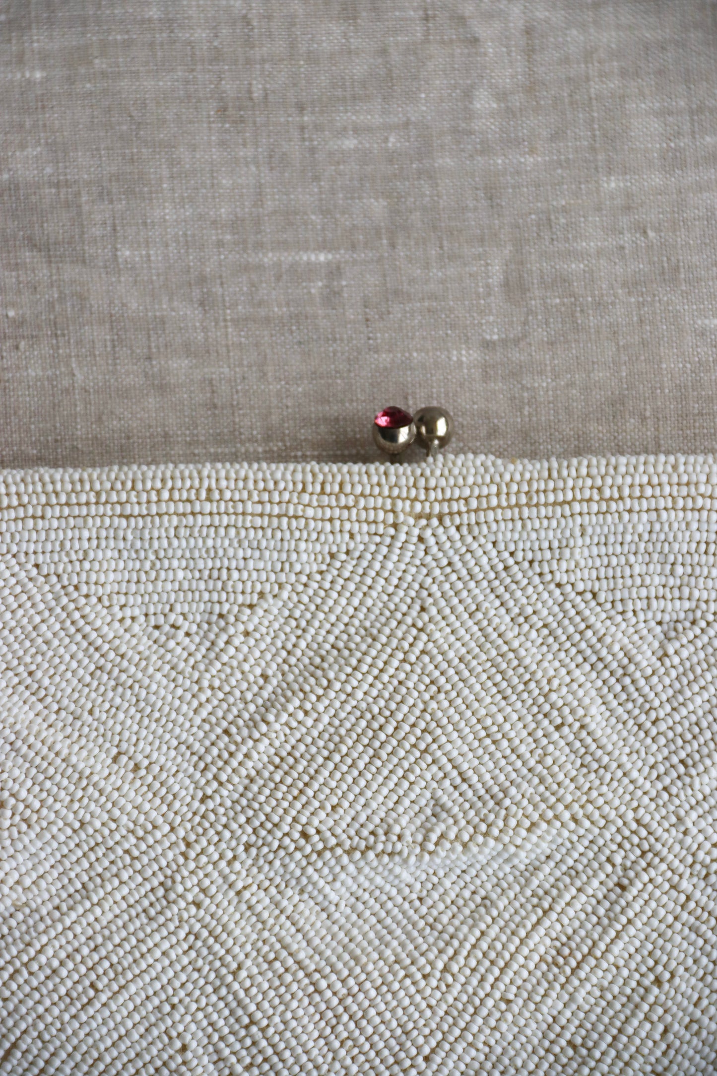White Beaded Kisslock Clutch with Pink Rhinestones