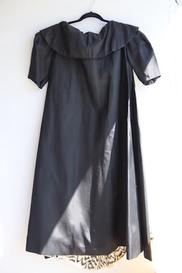 Black silk taffeta evening coat with animal print lining
