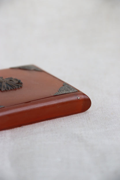 amber-colored Bakelite box