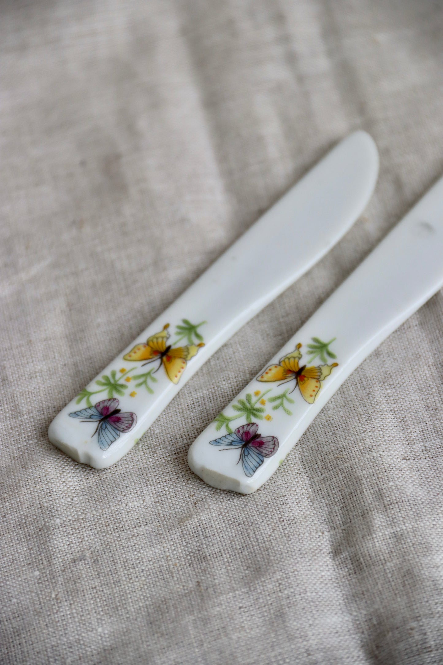 Set of Two Ceramic Butterfly Cheese Knives - as is