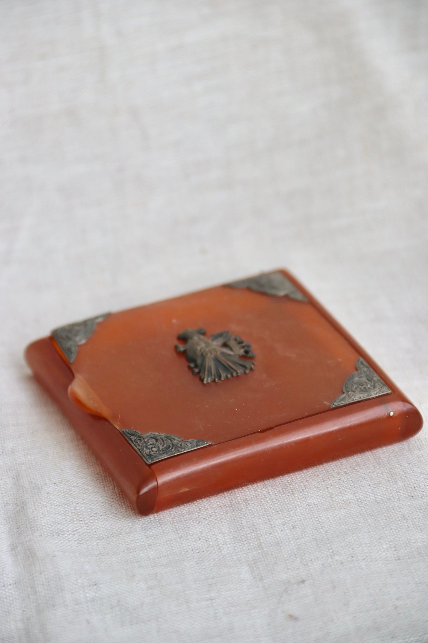amber-colored Bakelite box