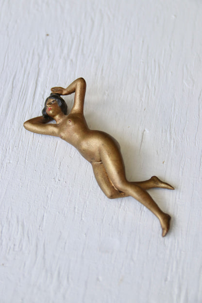 Mini reclining female figure sculpture