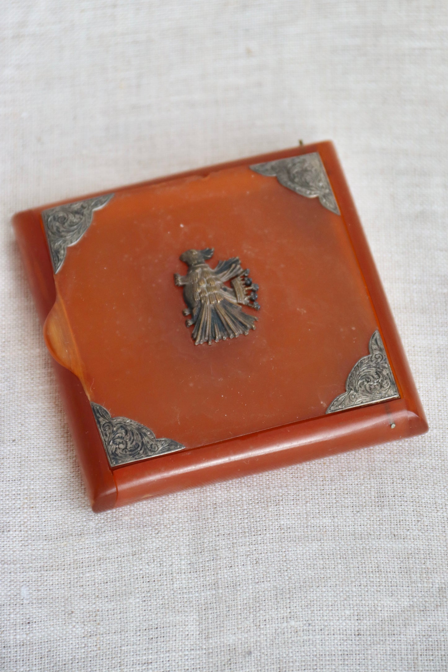 amber-colored Bakelite box