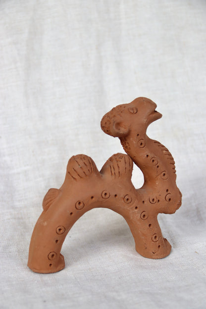 Hand-sculpted red earthenware clay figurine
