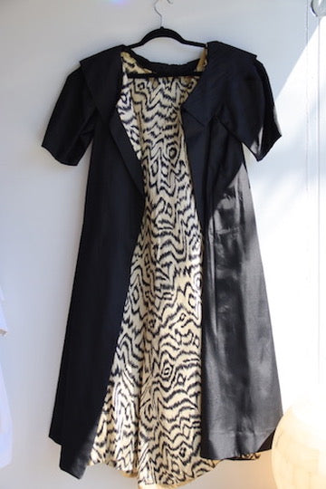 Black silk taffeta evening coat with animal print lining