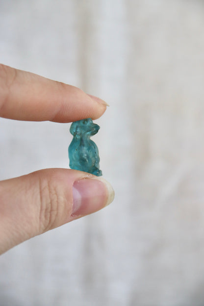 Miniature blue glass dog with broken nose