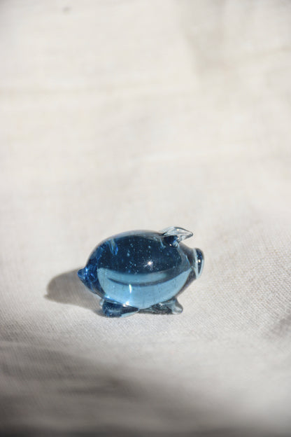 Miniature blue glass pig